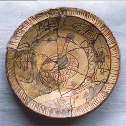 Fig 10 White slip-coated dish with sgraffito design showing a bird and worm. Excavated from the kiln site at Brookhill Pottery 