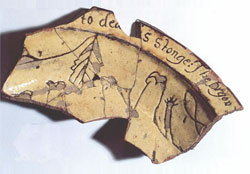 Fig 12 Fragment of white slip-coated dish with sgraffito design depicting an elephant with the motto 'to dea..s stonge: The Drgon'. Excavated from the kiln site at Brookhill Pottery 