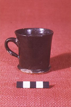 Fig 2 Dark-glazed cup, excavated from the kiln site at Brookhill Pottery. Copyright Peter Davey