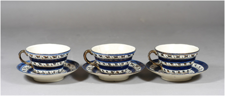 Three teacups and saucers signed on the base with Dora Billington's initials