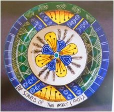 Espresso saucer painted and inscribed by Wonderboy Nxumalo, 2001.